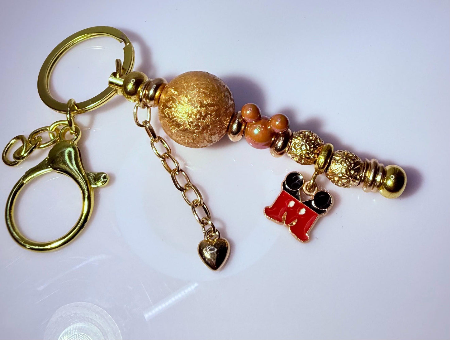 Gold Mickey Maus Perlen-Schlüsselanhänger: Disney-inspirierter Taschenanhänger