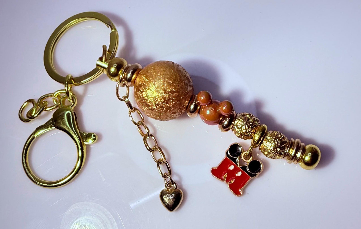 Gold Mickey Maus Perlen-Schlüsselanhänger: Disney-inspirierter Taschenanhänger