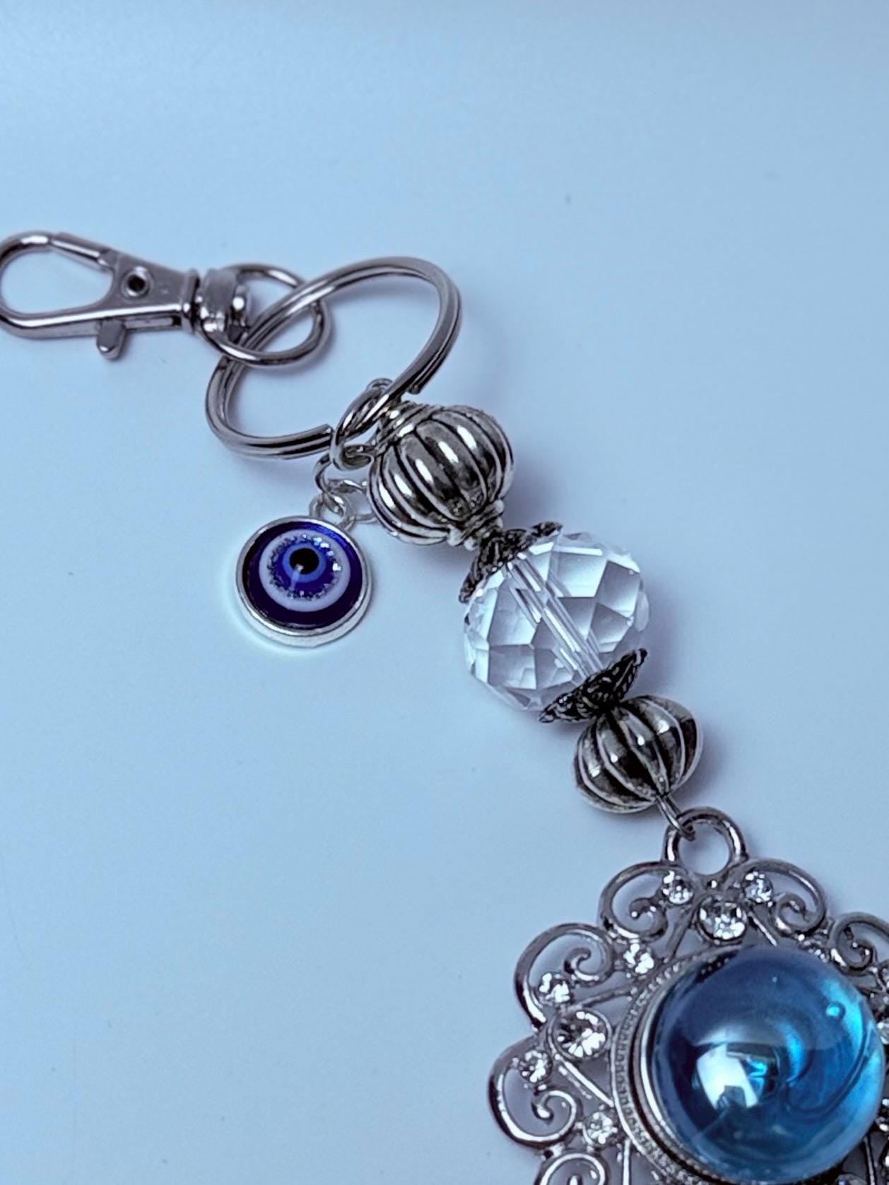 Blauer Edelstein Evil Eye Taschenanhänger: Boho Silberquaste, Feder & Kristall