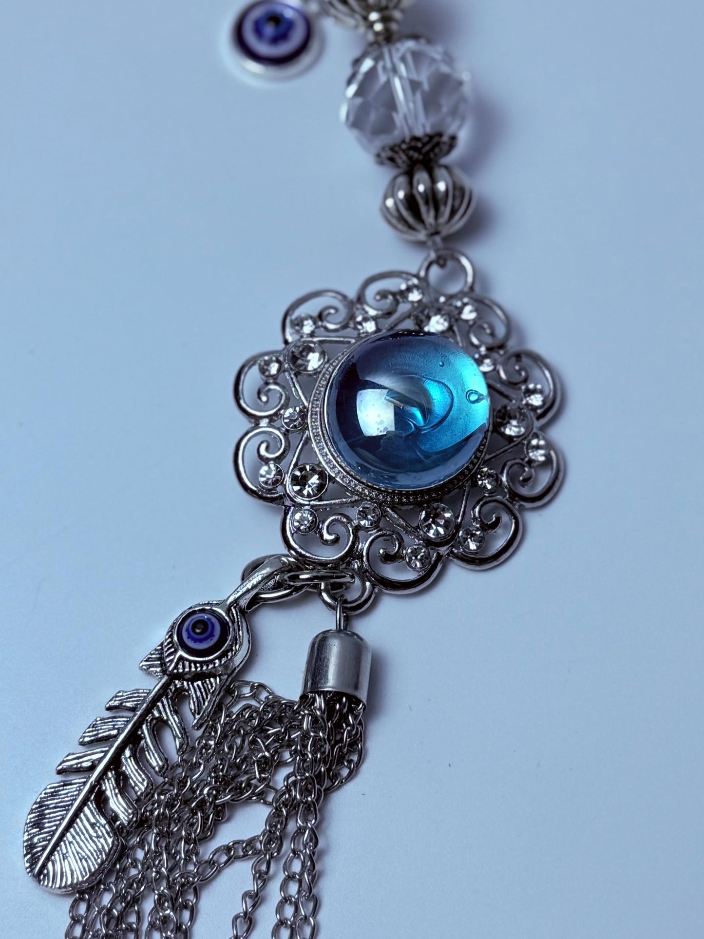 Blauer Edelstein Evil Eye Taschenanhänger: Boho Silberquaste, Feder & Kristall