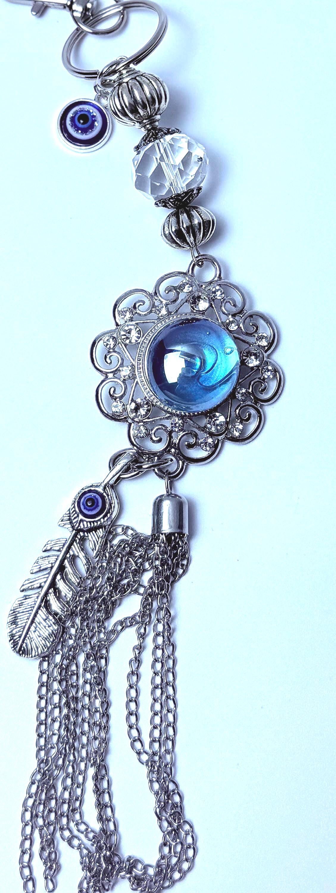Blauer Edelstein Evil Eye Taschenanhänger: Boho Silberquaste, Feder & Kristall
